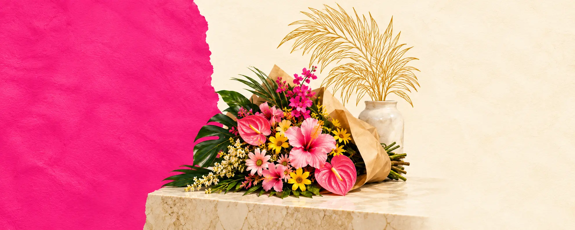 Tropical flowers wrapped in kraft paper beside an ivory vase and gold palm linework